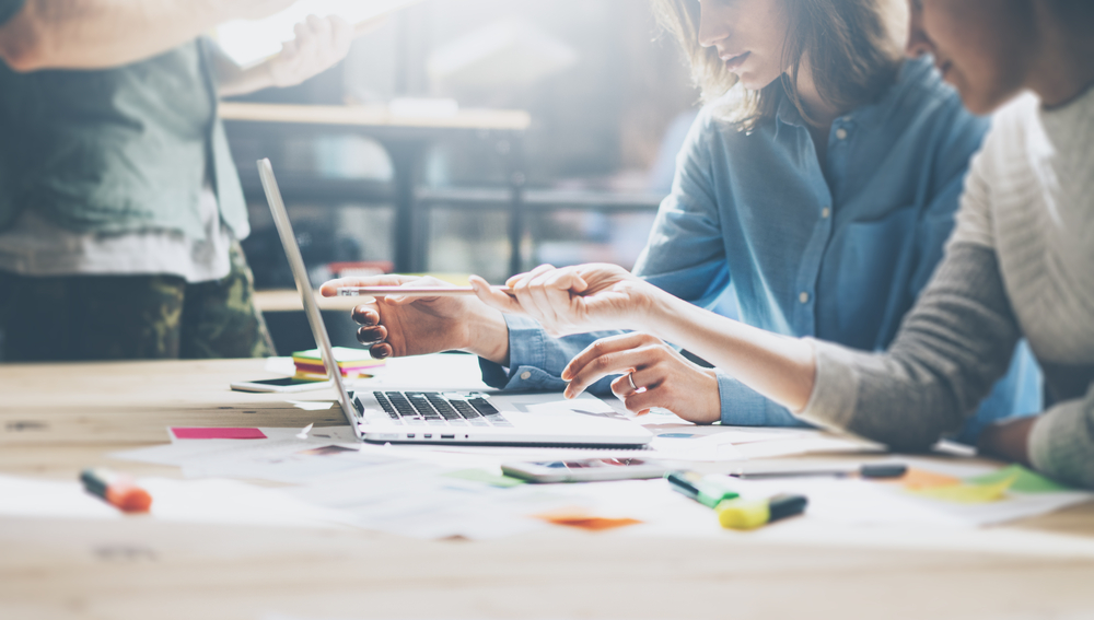 Headley Media colleagues discussing b2b display advertising strategy